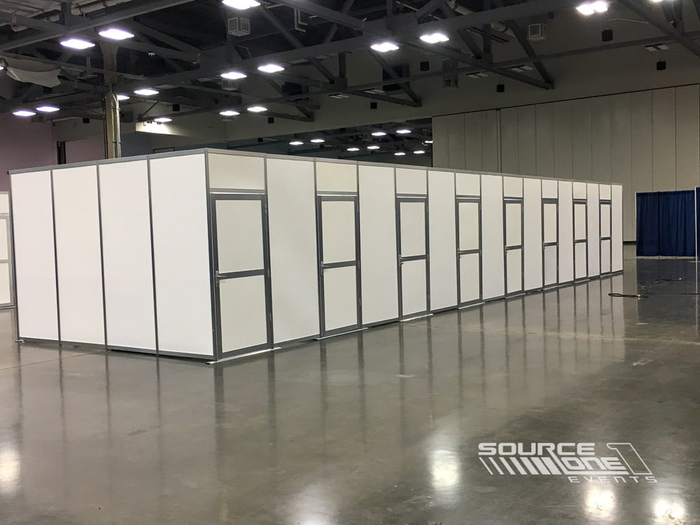 Custom hard-wall meeting room installation with enclosed interview spaces and premium modular construction for recruiting events.