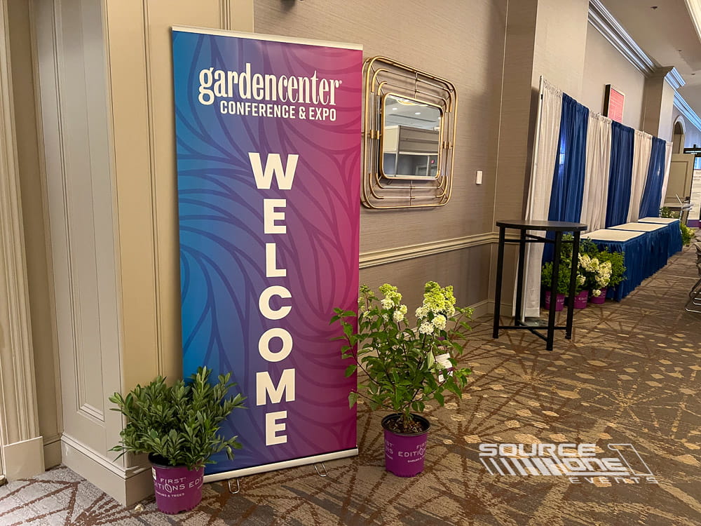 Welcome banner stand greeting attendees at the Garden Center Expo.