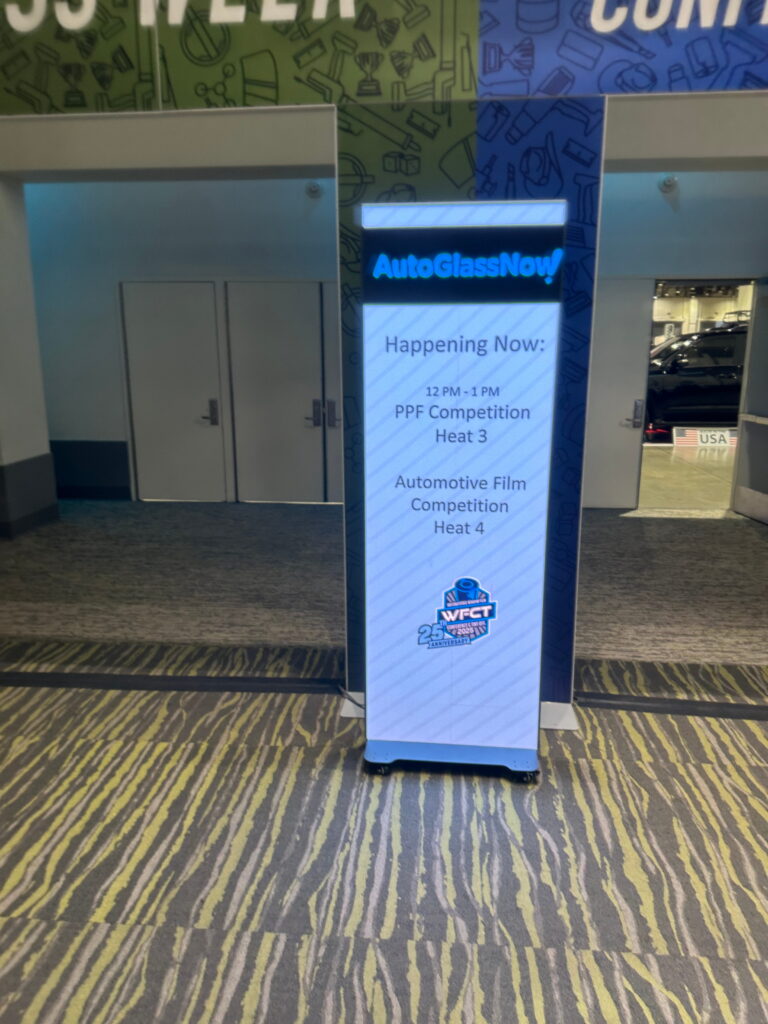 Digital event schedule kiosk displaying conference information