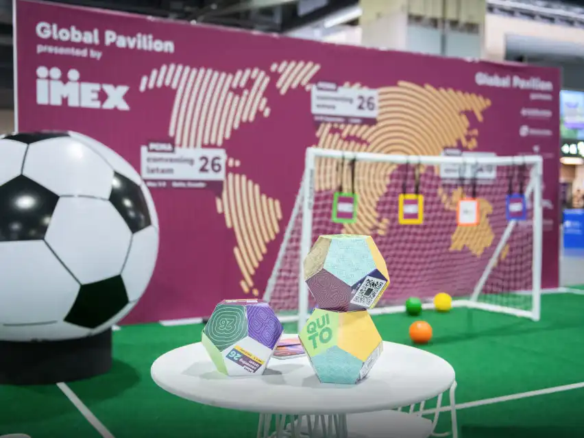 Interactive event display featuring a world map graphic and seating.