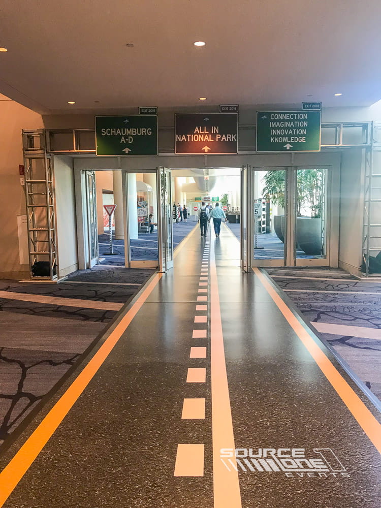 Custom branded flooring installed at the entrance to a Medline event space.