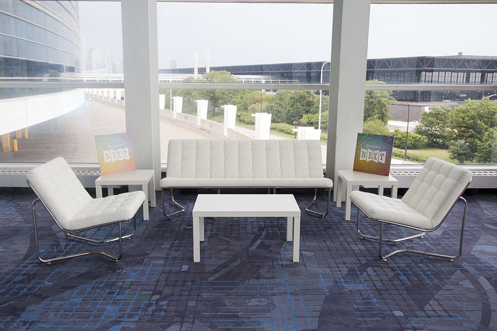 White piano-inspired experiential activation display for luxury event environment