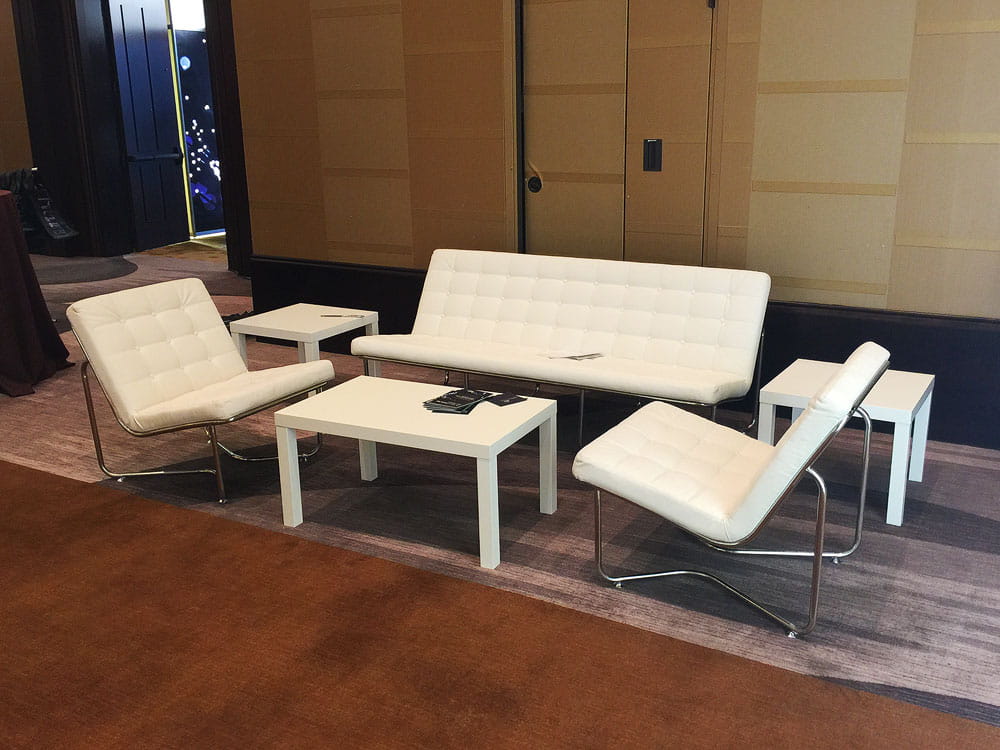 Contemporary white leather furniture rental for trade show booth lounge