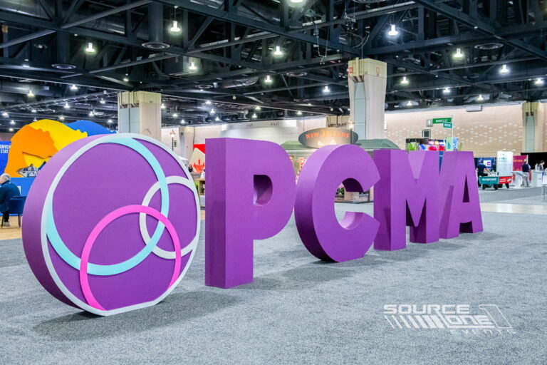 Oversized three-dimensional PCMA letters creating an interactive attendee photo opportunity.