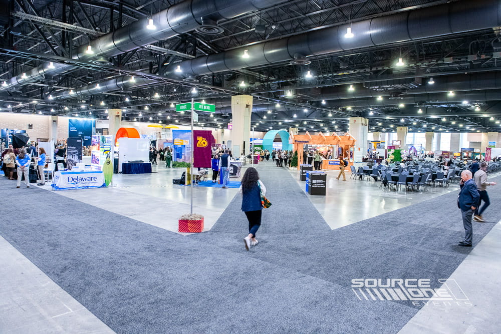 Custom aisle carpeting designed to improve attendee flow through a trade show floor.