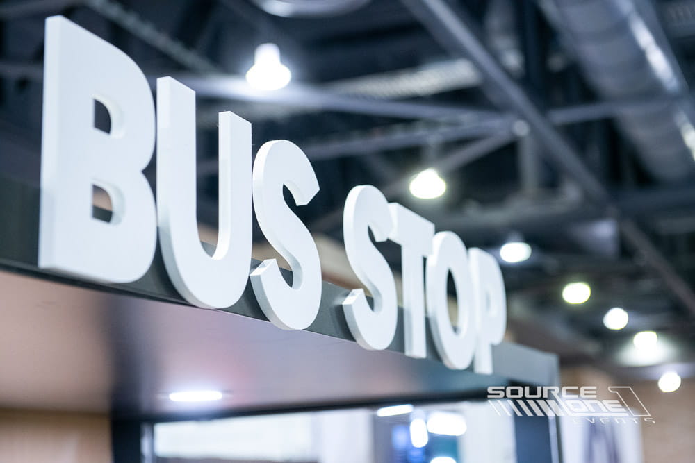 Three-dimensional bus stop themed installation providing seating and a branded photo opportunity.