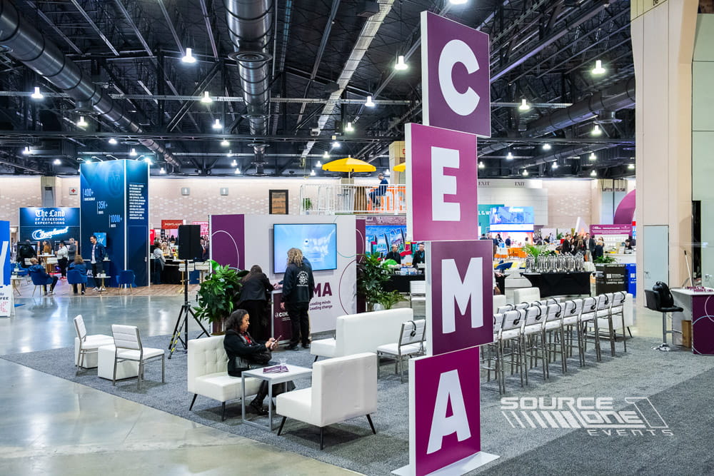 Large three-dimensional CEMA letter installation creating an interactive branded photo opportunity within the convention center.