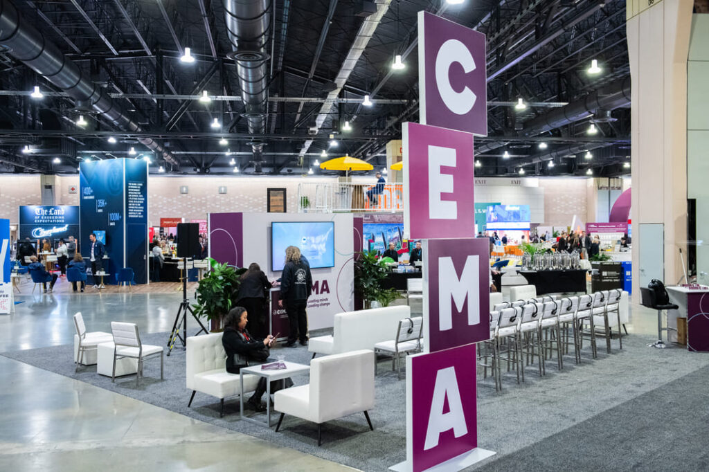 Custom trade show booth created for CEMA with branded graphics and attendee engagement areas.