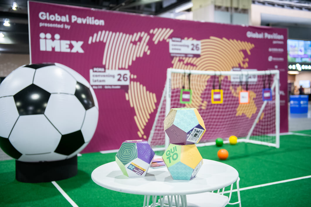 Display cases showcasing conference exhibits and branded products.