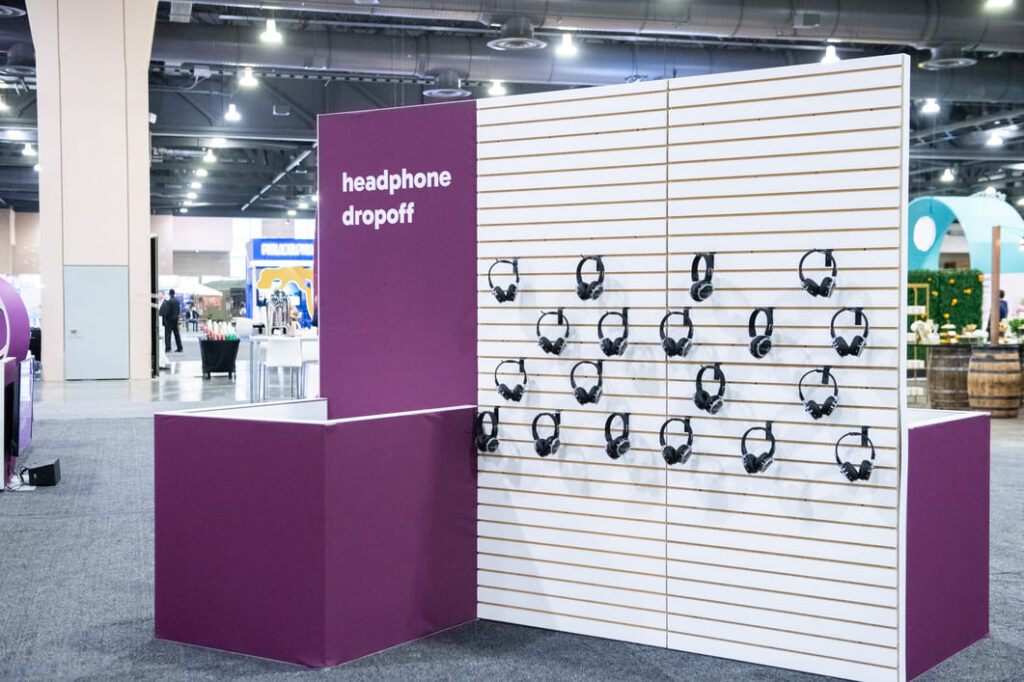 Interactive headphone wall where conference attendees can listen to audio content and presentations.