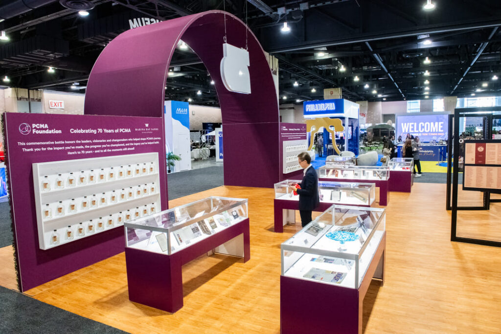 Interactive museum and retail exhibit featuring branded displays for conference attendees.