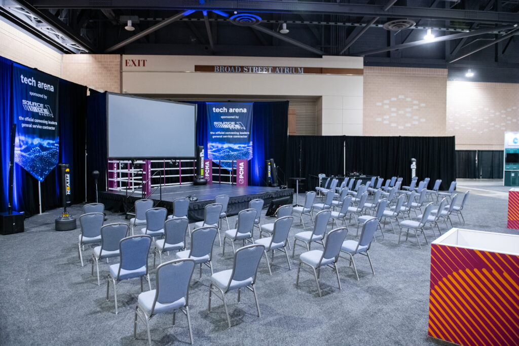Conference general session room featuring professional staging and AV production