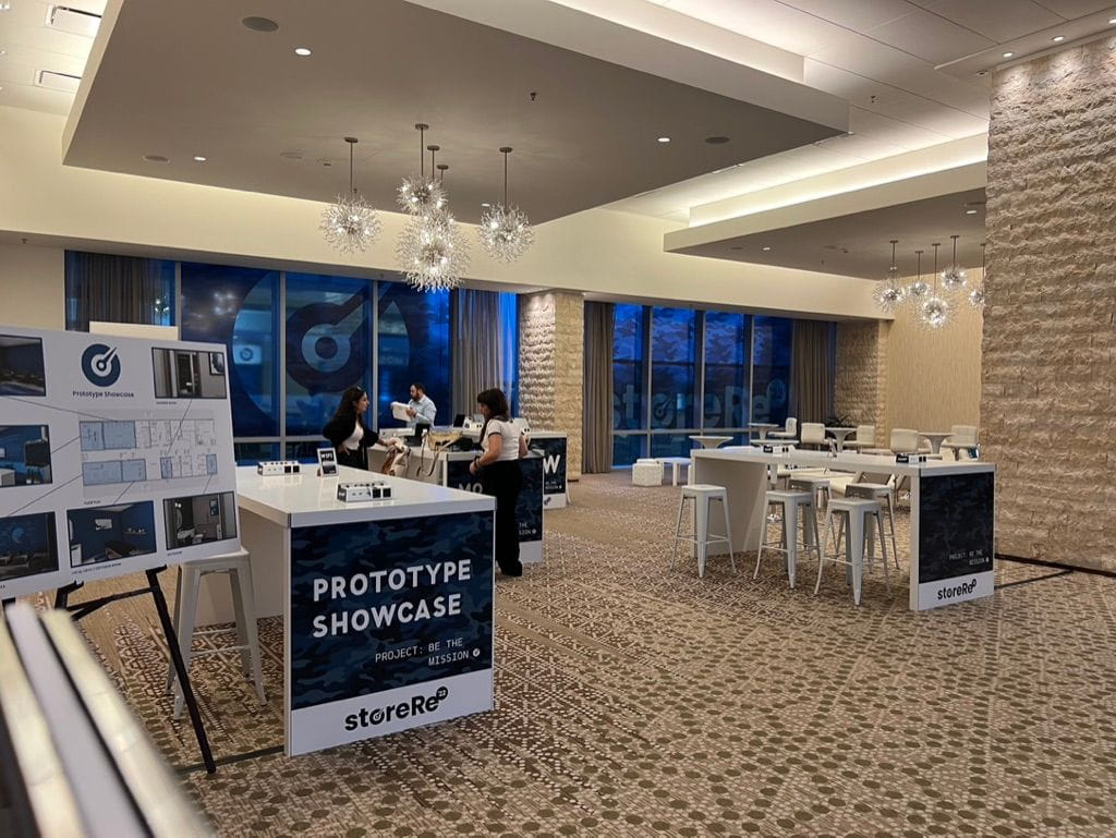 Corporate conference registration and networking lounge designed by SourceOne