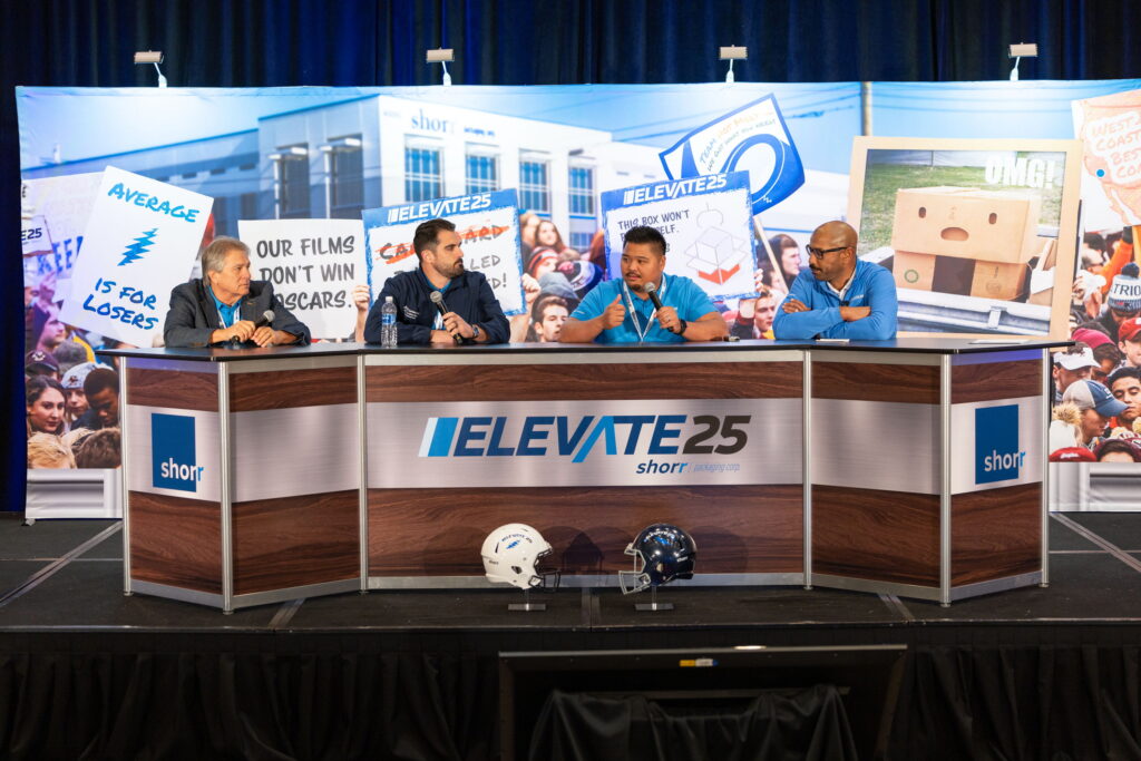 Branded conference broadcast desk and content studio activation at live event