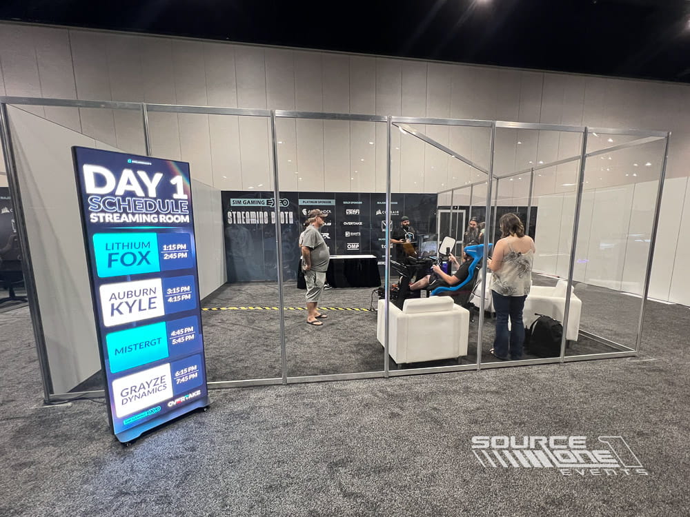 Dedicated esports streaming area featuring gaming stations, branded graphics, digital displays, and production equipment for live tournament coverage.