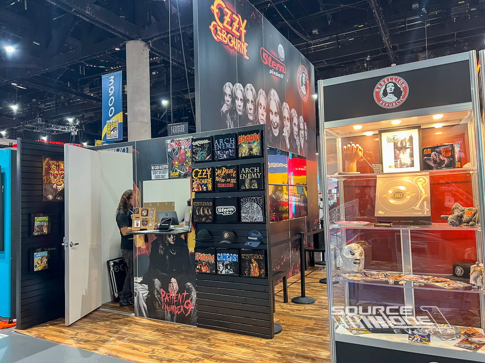 Large comic convention exhibit showcasing custom exhibit fabrication, oversized graphics, and interactive gaming experiences.