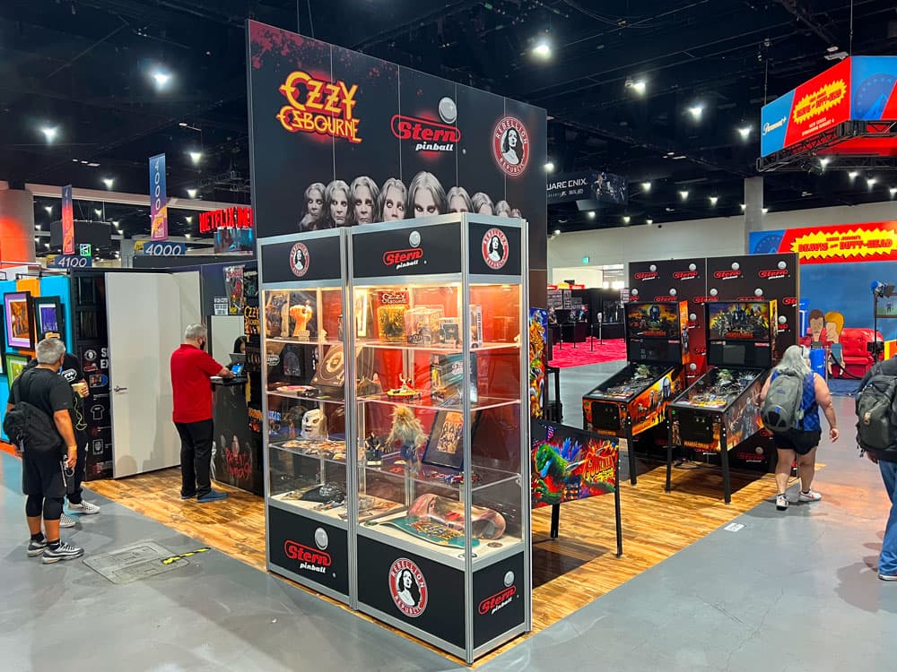 Immersive entertainment-themed trade show exhibit with custom product displays