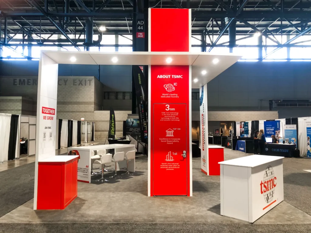 Technology company exhibit featuring architectural branding and attendee engagement
