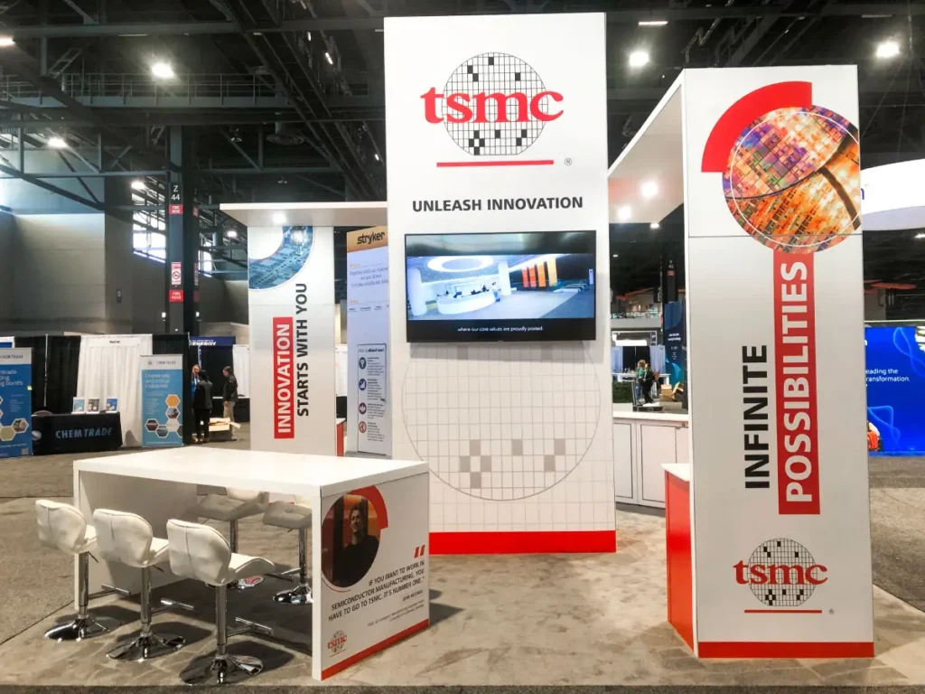TSMC trade show booth featuring branded technology showcase environment