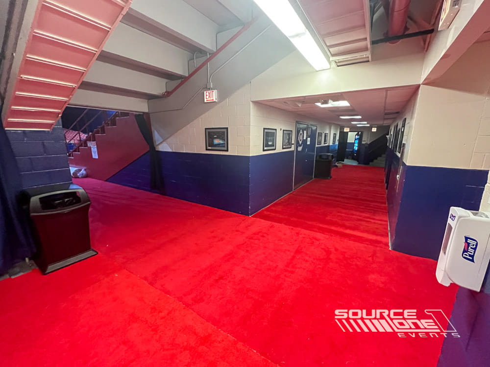 Branded event flooring installed inside the UIC Pavilion for graduation ceremonies.