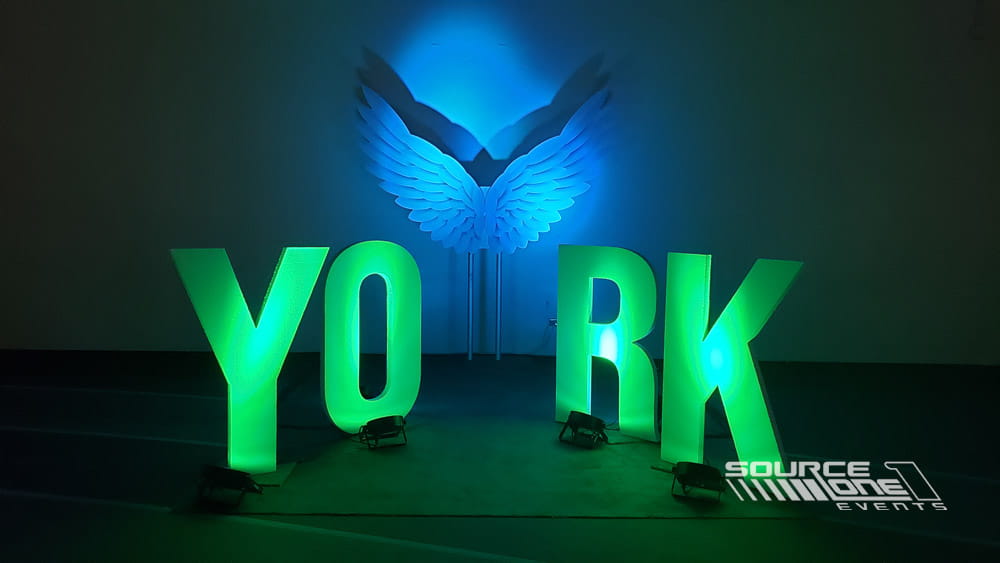 Freestanding illuminated 3D event letters used as decorative branding.