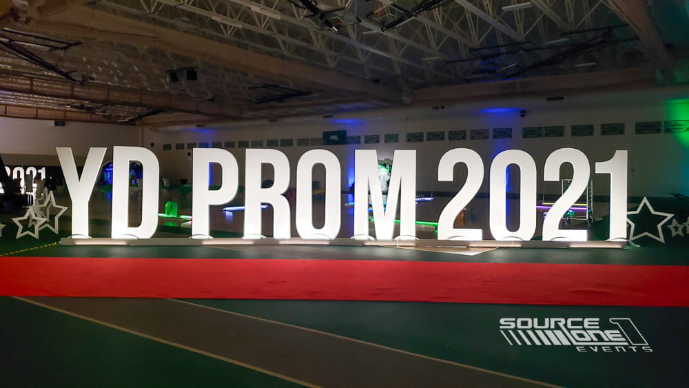Large illuminated 3D letters creating a custom event photo opportunity.